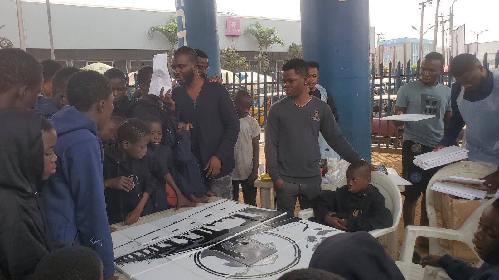 An art training session with children, Mokola underbridge, Ibadan, Emmanuel Anaiye Ifebunmi art