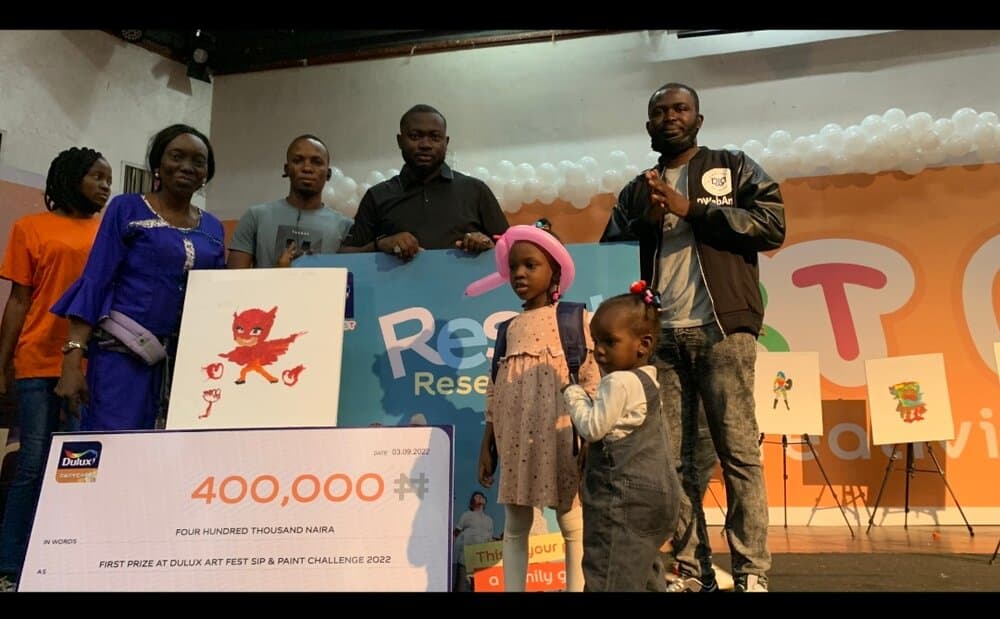 Presenting the first prize, Dulux Art Fest Sip & Paint Challenge, 2022, Emmanuel Anaiye Ifebunmi art