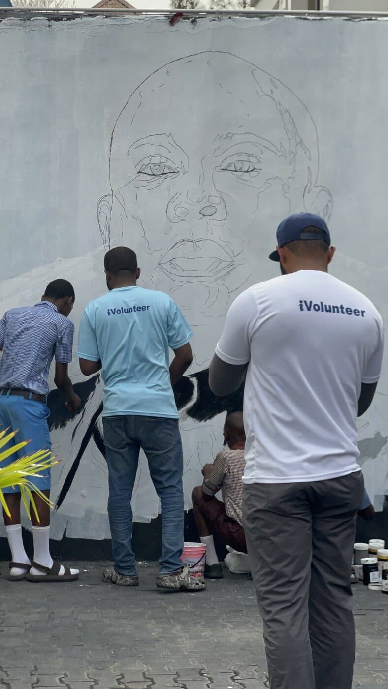 Painting in the mural with the iVolunteer team, 2019, Emmanuel Anaiye Ifebunmi art