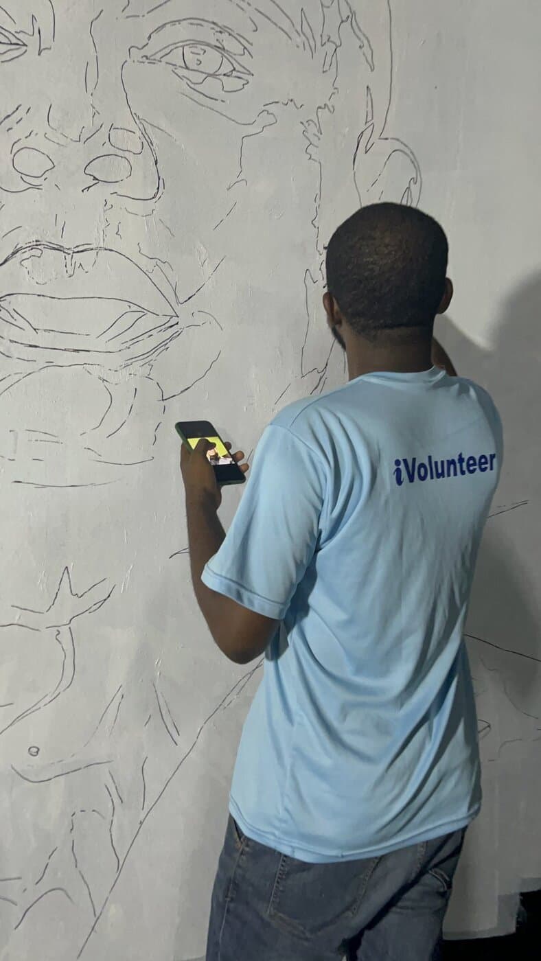 Sketching a mural portrait on site, 2019, Emmanuel Anaiye Ifebunmi art