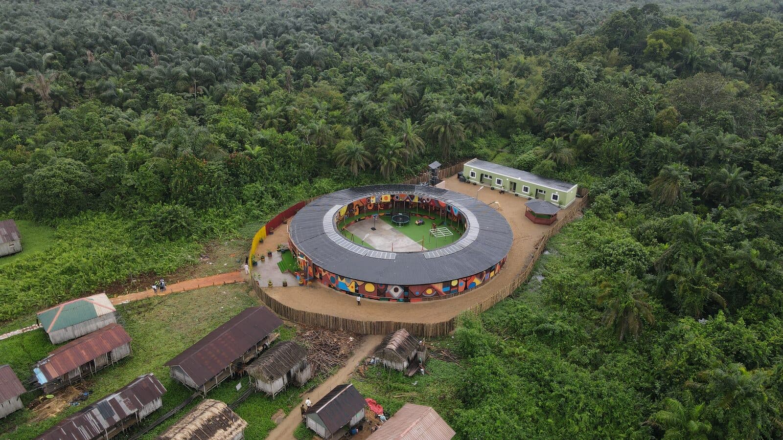 The Saga Project seen from above, set within the village it serves, 2026, Emmanuel Anaiye Ifebunmi art