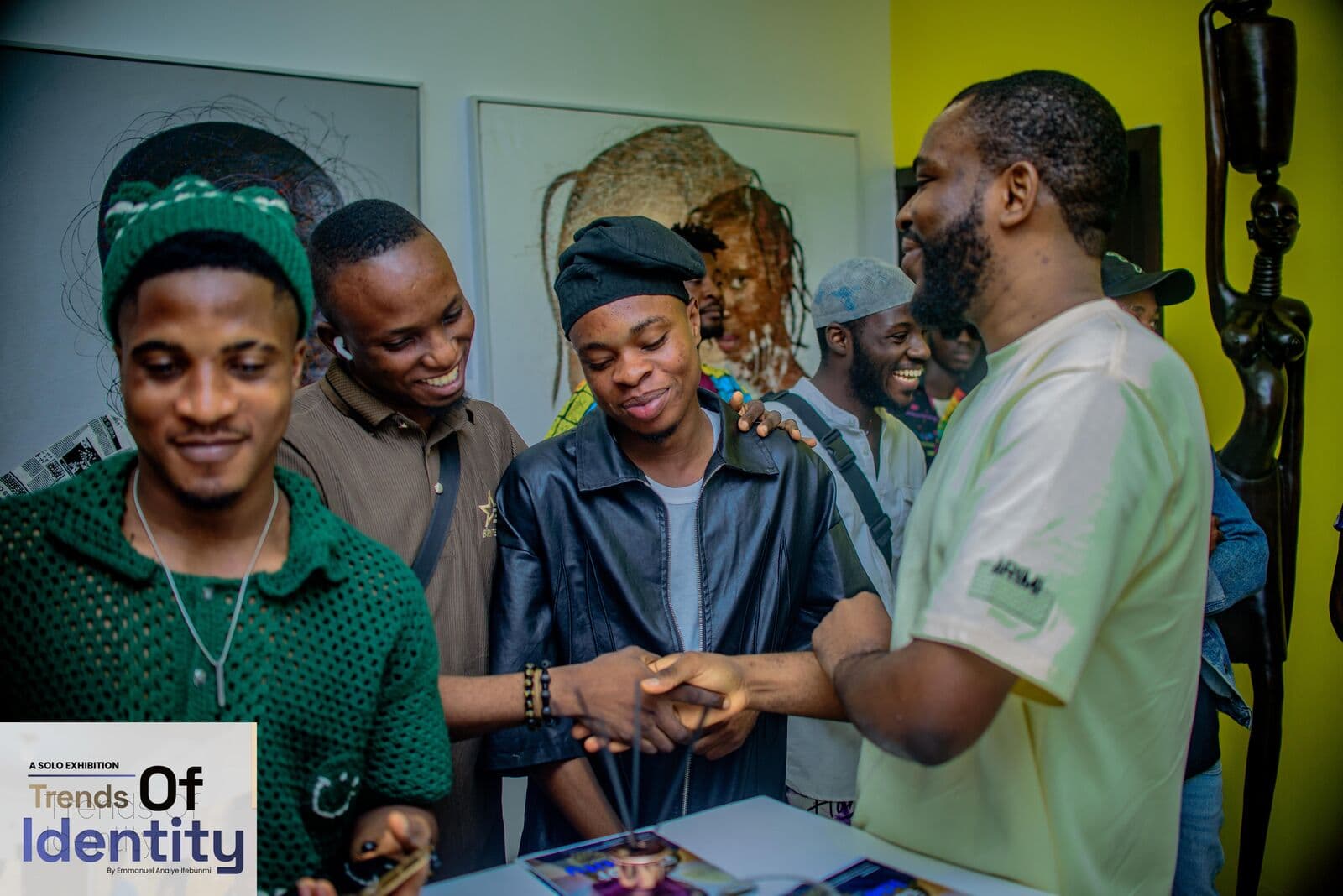 With guests at the Trends of Identity opening, Emmanuel Anaiye Ifebunmi art